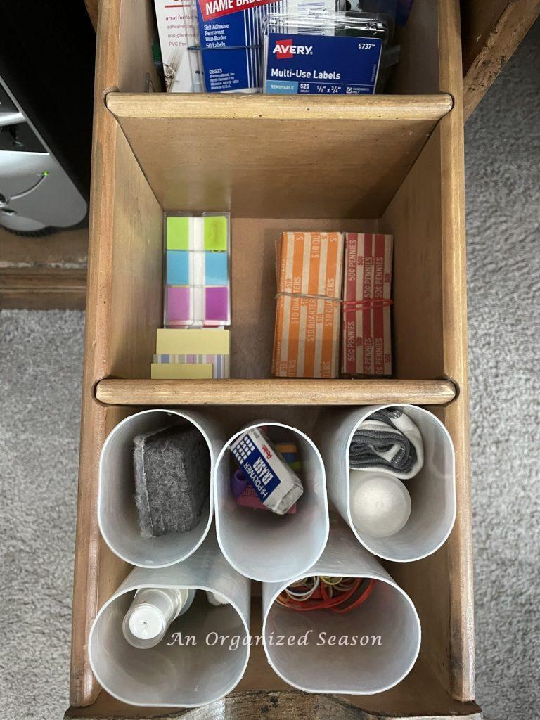 Using Crystal Light containers to organize items is a brilliant way to organize office supplies.