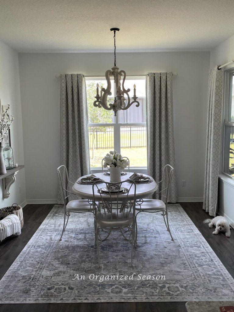A rectangle rug in a rectangle room shows how to choose the right rug for your dining table. 