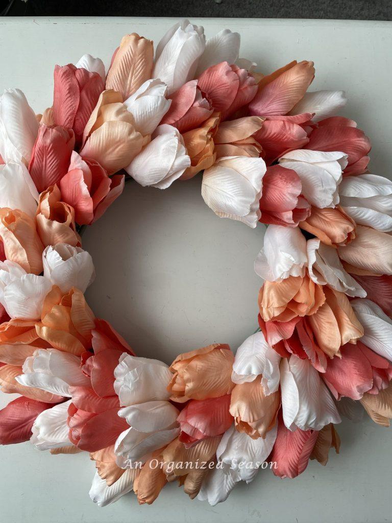 A wreath made of faux flowers. 