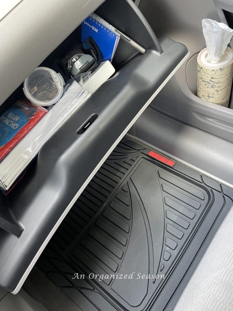 Organized glove compartment in a car. 