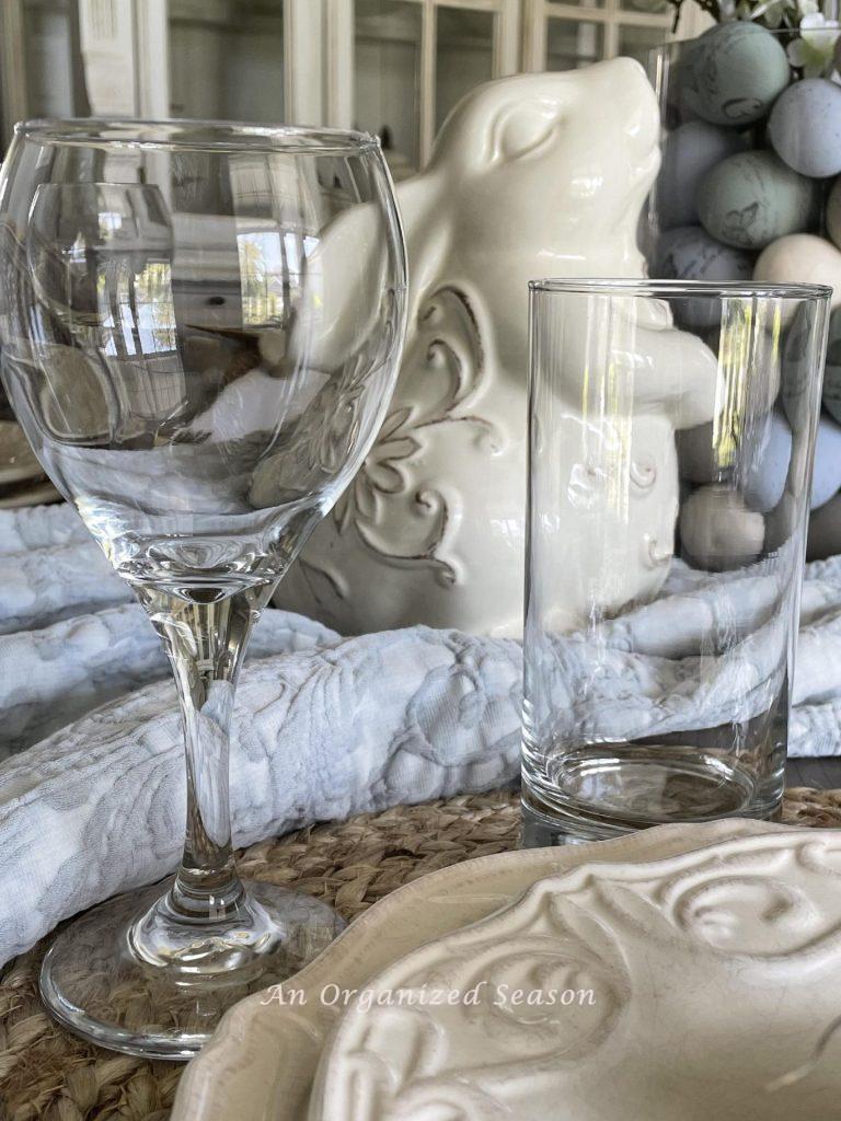 A simple wine and water glass provide Easter table decor.