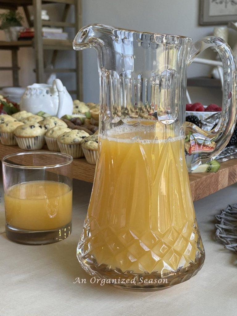 A blend of juices in a glass pitcher. 