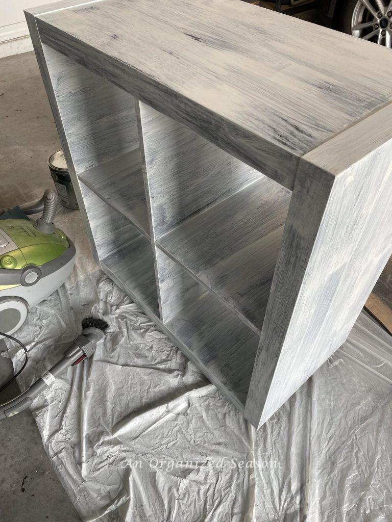 To paint laminate cabinets, start with one coat of primer. 