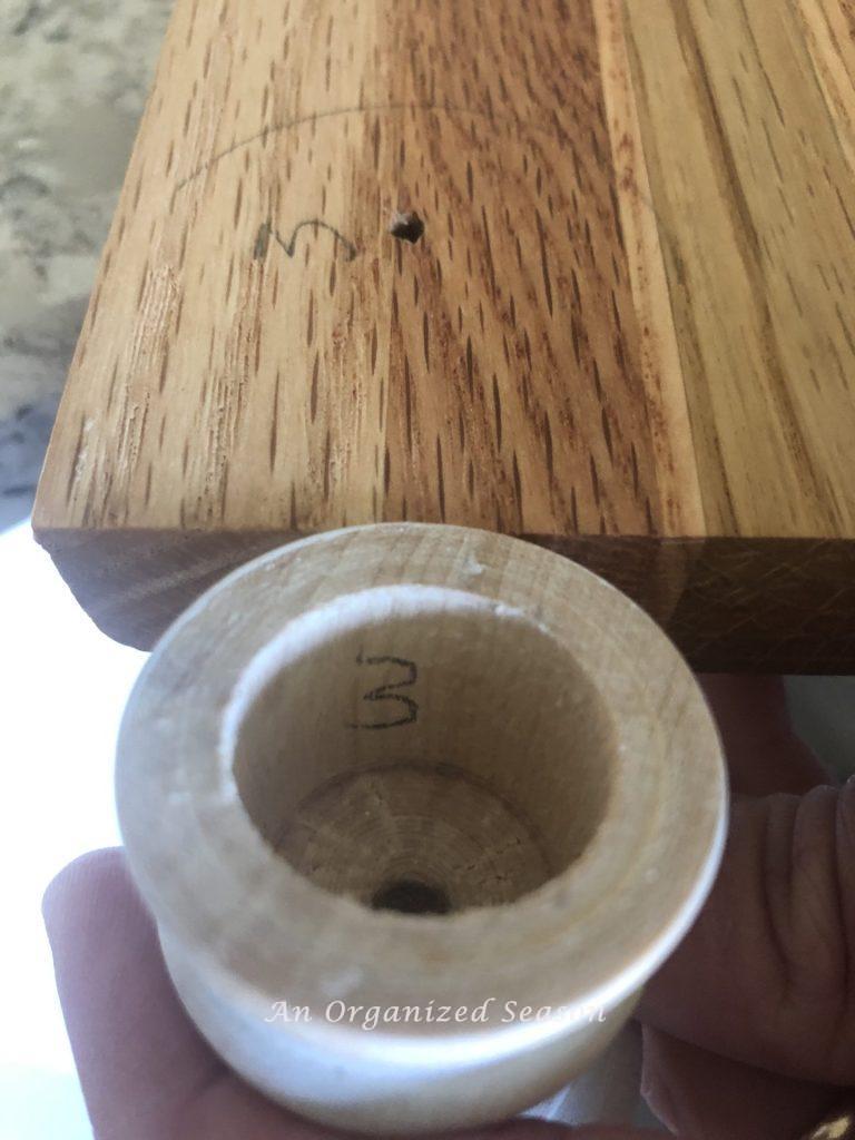 Screw holes in the DIY wood board to attach the feet.