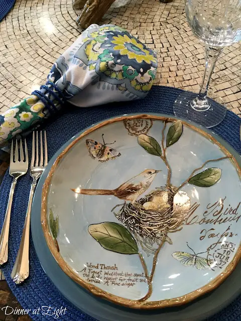 Table setting with bird plate.