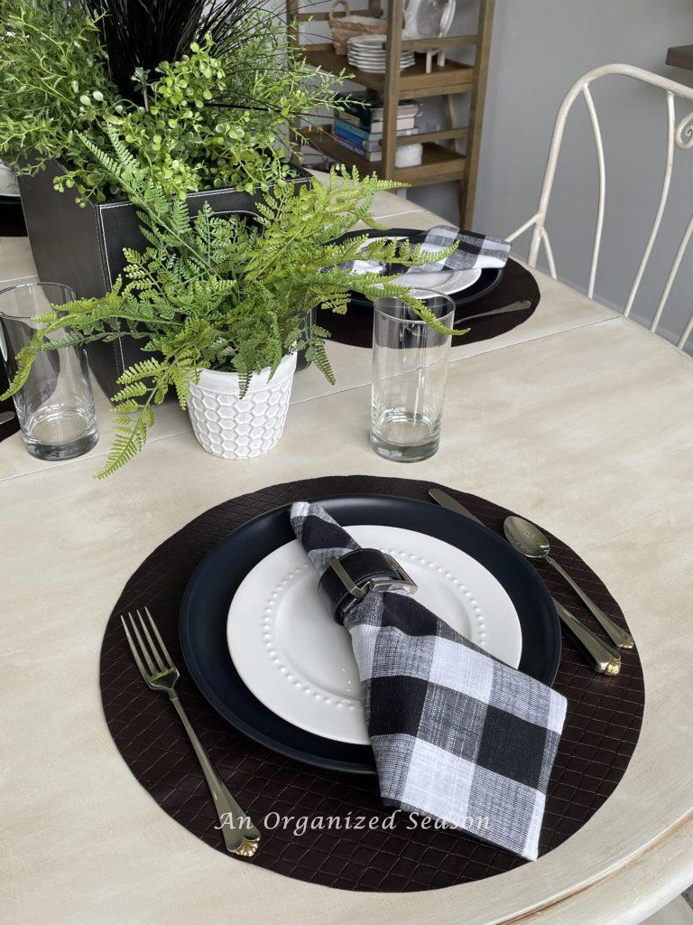 A place setting on a kitchen table. 