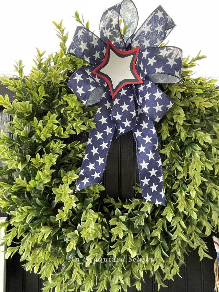 Wreath with a large blue and white star bow!