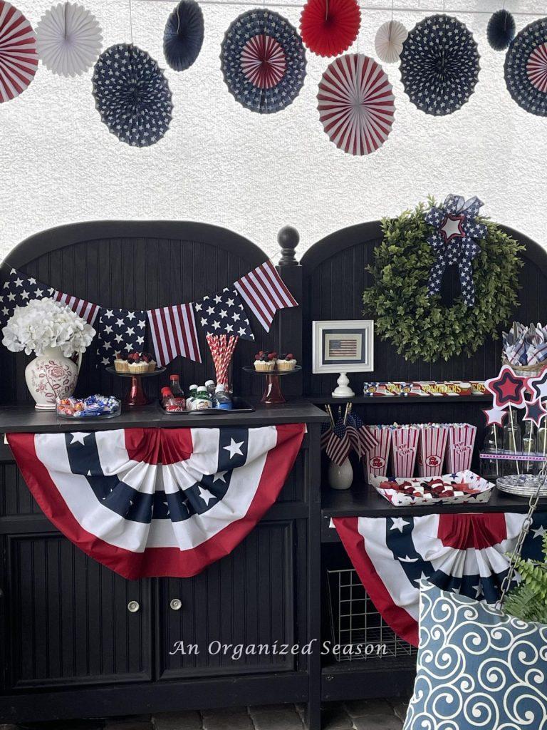 Potting bench set up for a fourth of July party. 