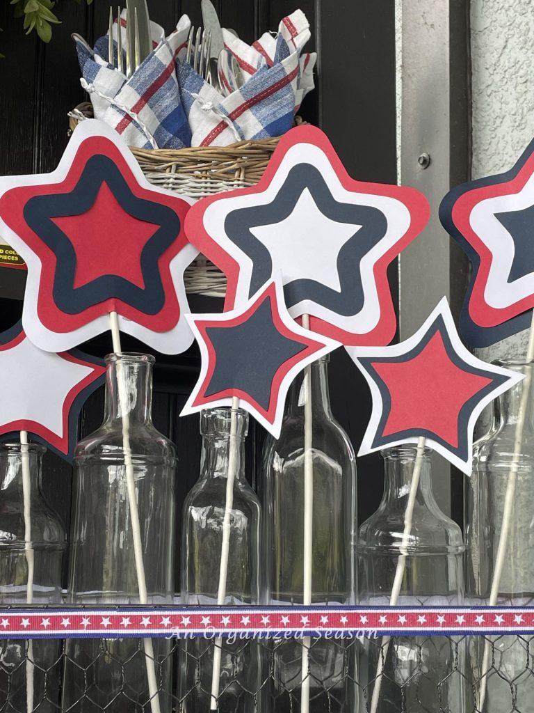 Red, white, and blue paper stars on candy sticks. 