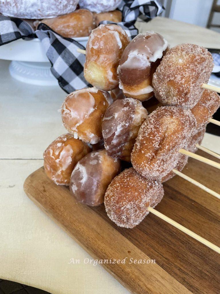 Donut holes on bamboo skewers.