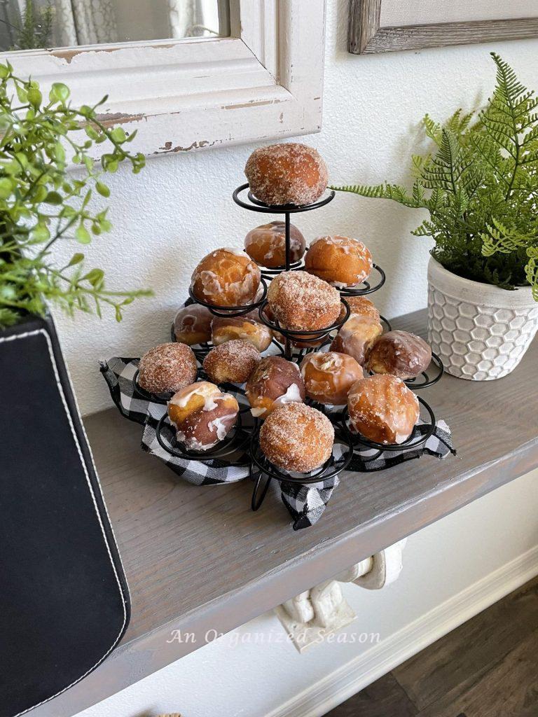 Donut holes displayed on a cupcake holder for Father's day. 