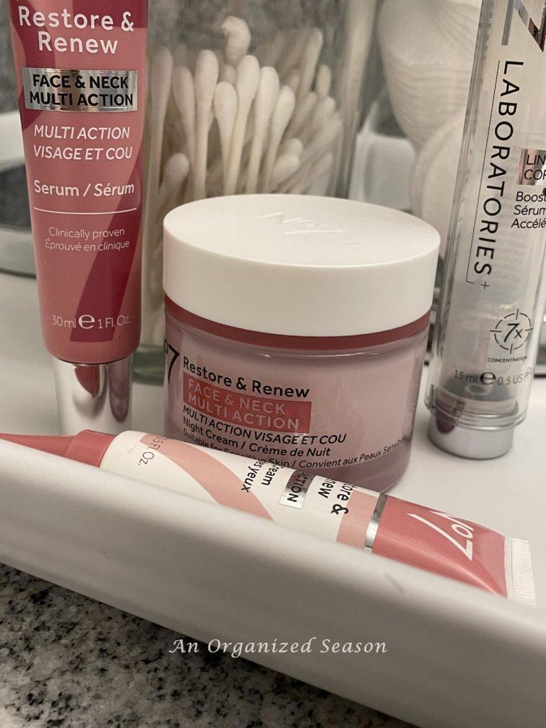 Skin care products laid out for a nighttime routine. 