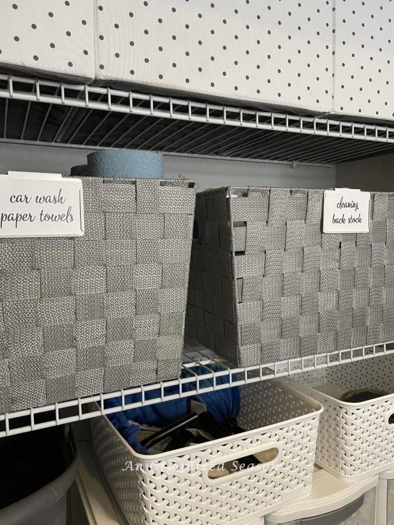 Gray weaved bins with white labels. 