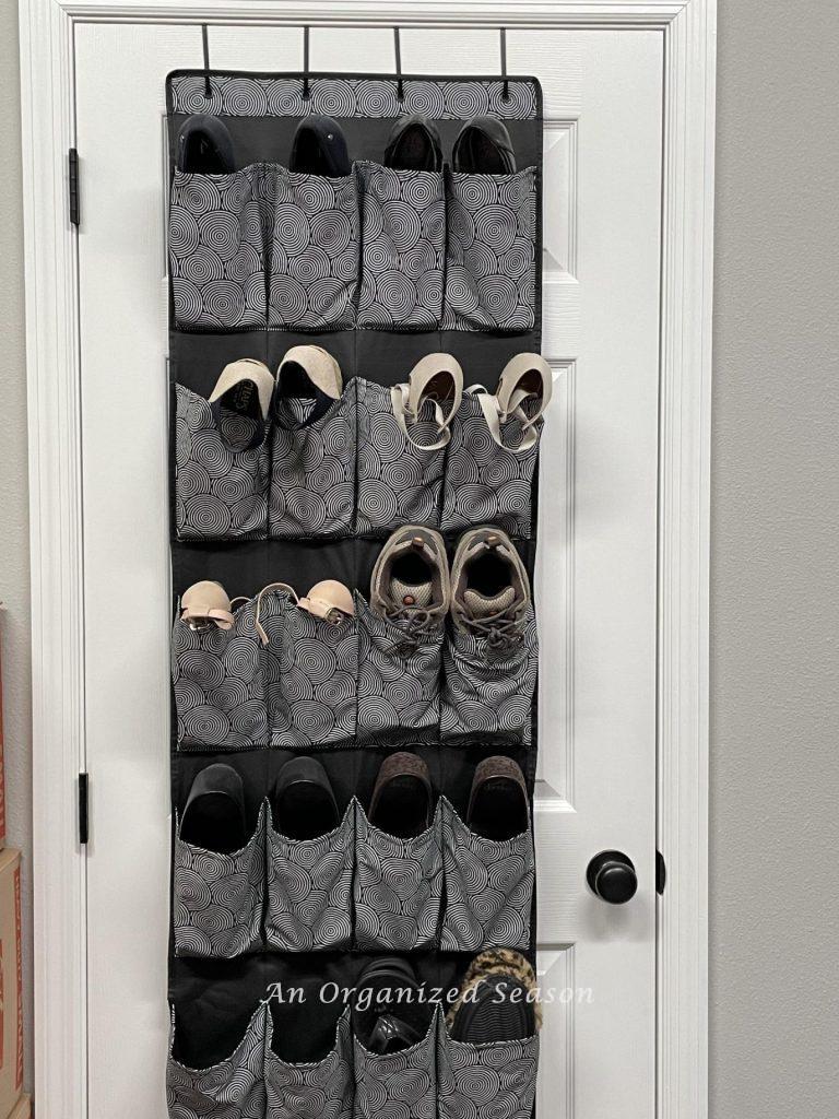 Closet organization idea # one is to hang a shoe organizer on a closet door. 