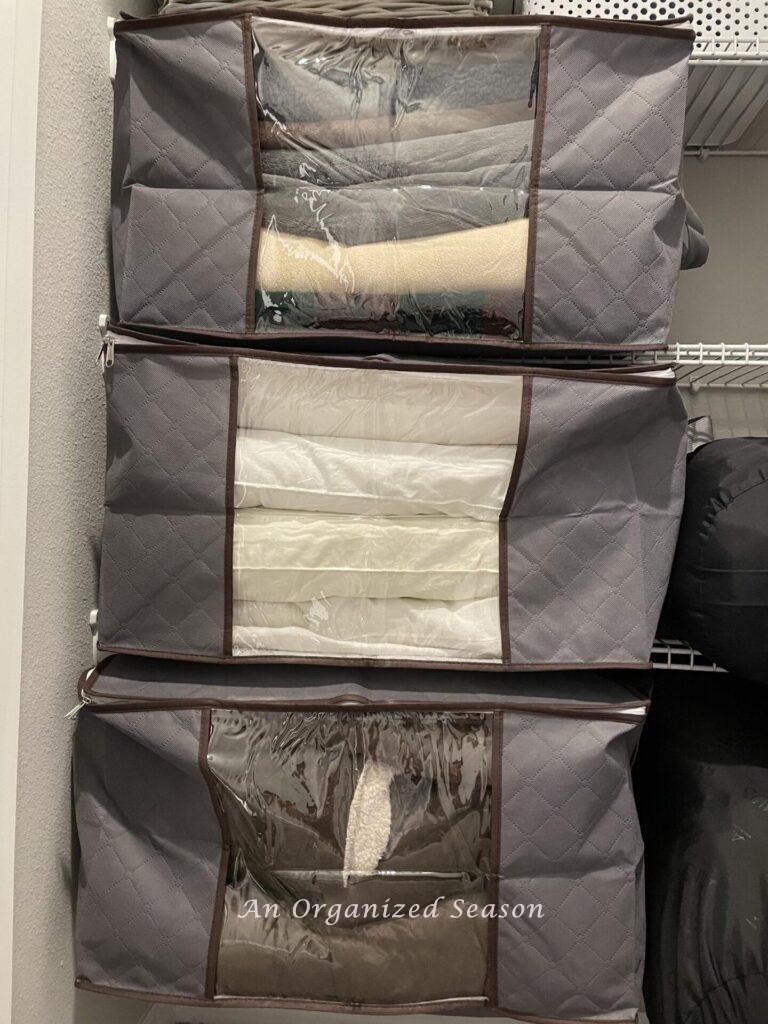 Storage tip for pillows and blankets, put inside plastic zippered bags in a closet. 