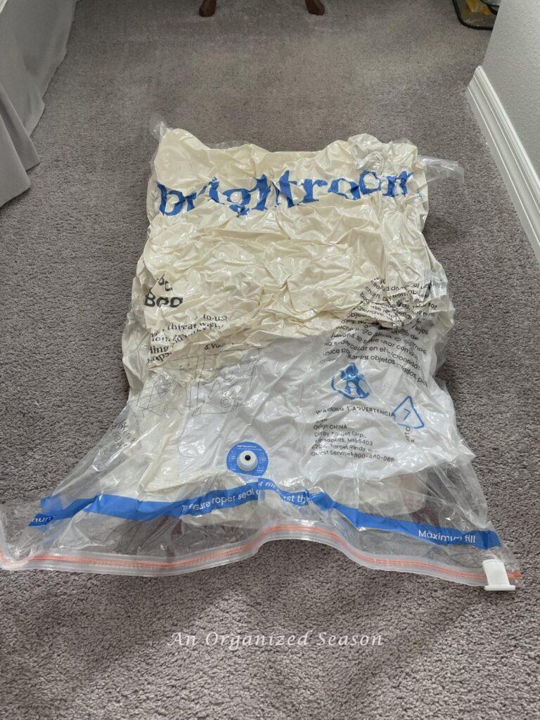 Pillow inserts inside a vacuum sealed bag are ready for storage.