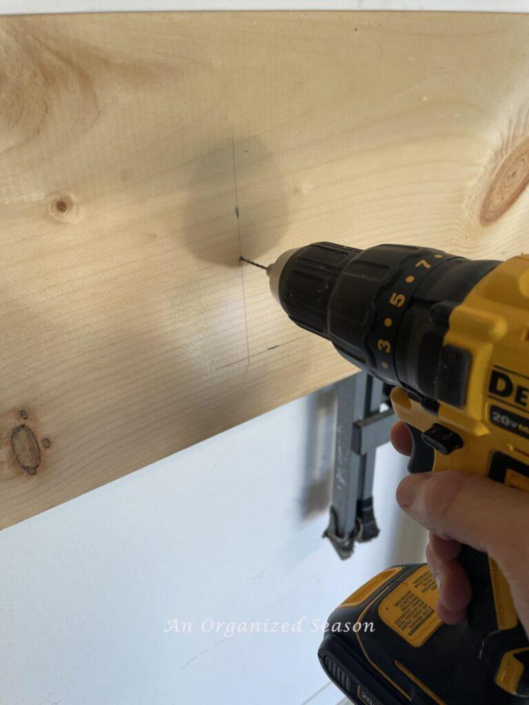 Drilling a hole in apron board