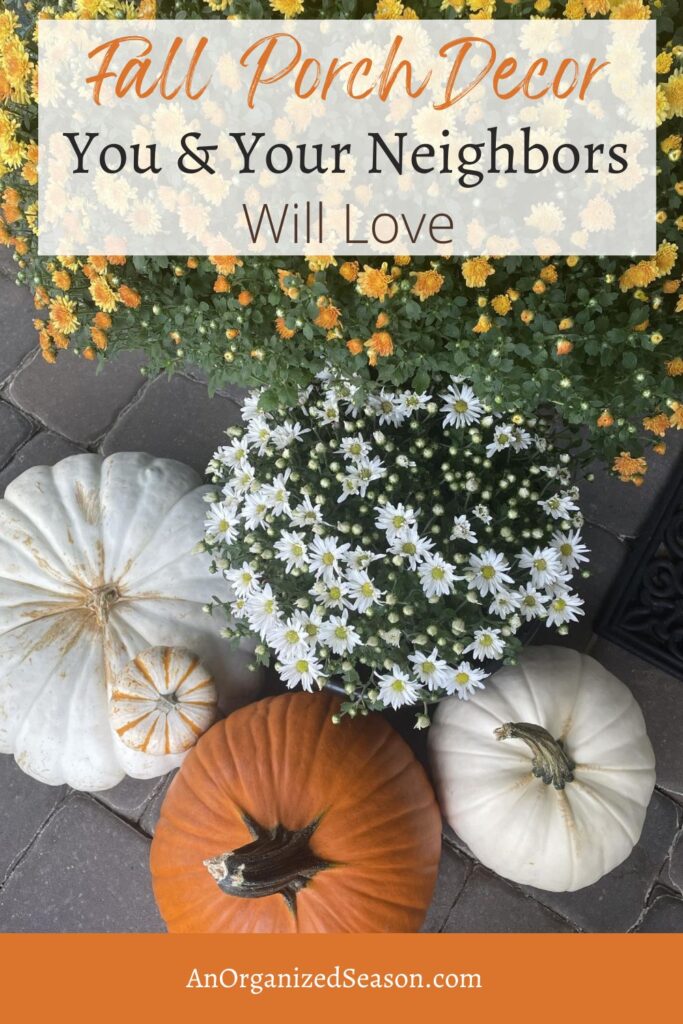 Orange and white mums and pumpkins