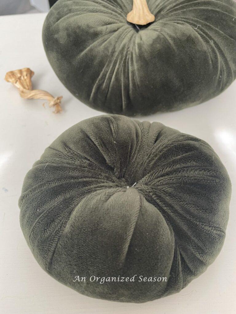 A velvet pumpkin without a stem. 