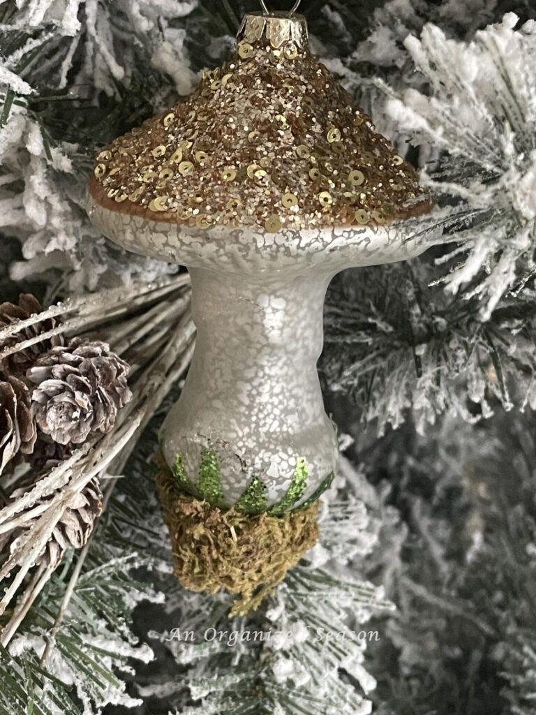 Step five to create a woodland Christmas tree is to add mushroom ornaments.