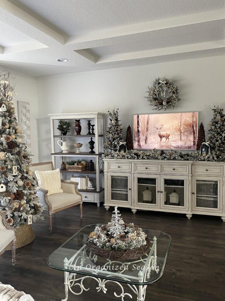 A living room decorated for Christmas in a Winter woodland theme. 