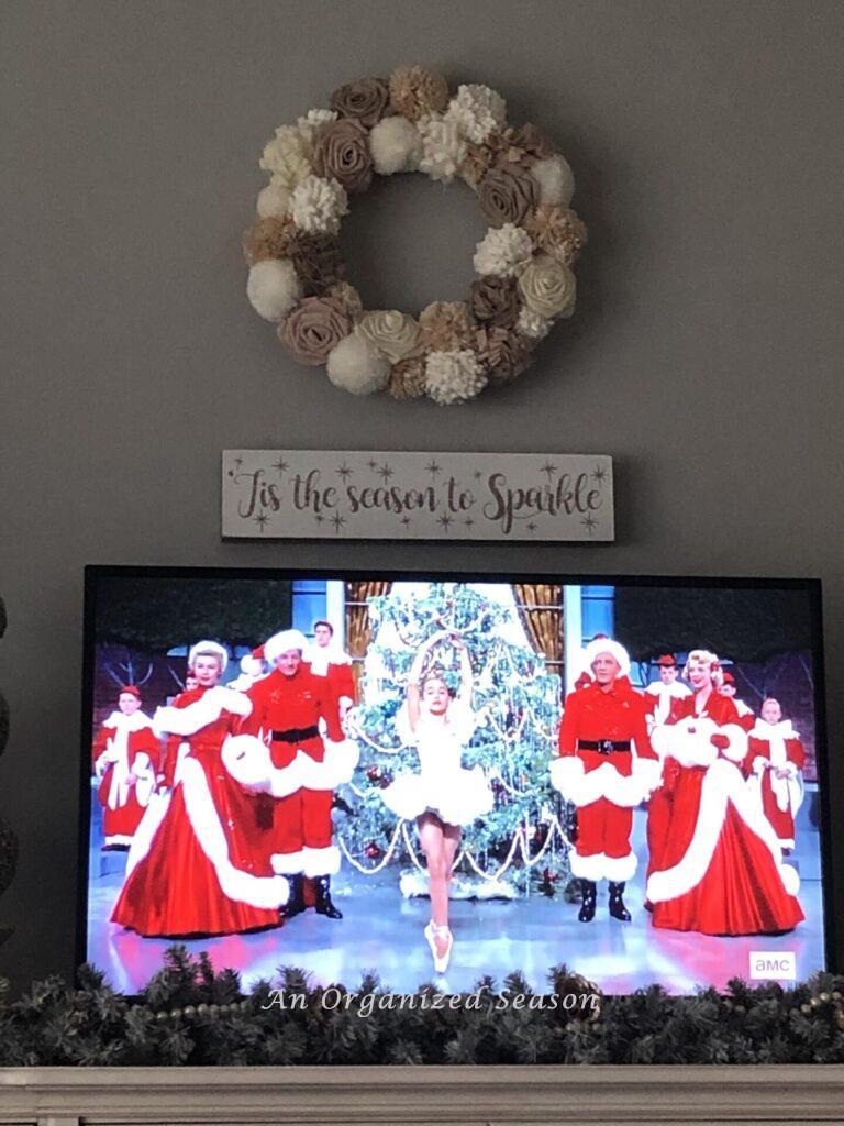 Create Christmas memories by watching movies like White Christmas on TV. 