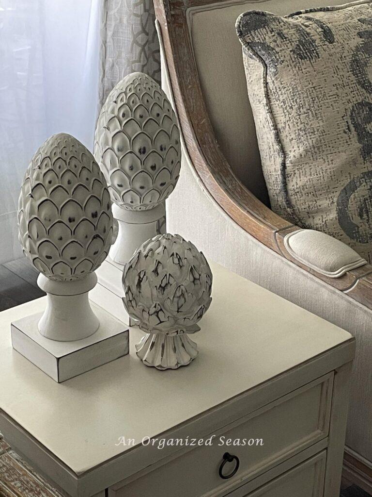 Artichoke statues that we thrifted and were part of our most popular decor posts of 2023. 