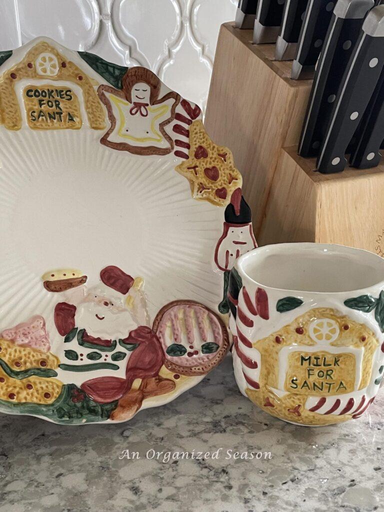 Display a Santa milk and cookie set for Christmas kitchen decor. 
