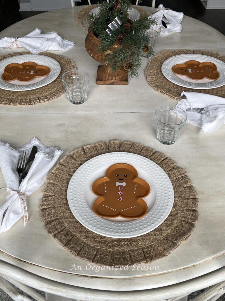 A table set with gingerbread man plates make the perfect  Christmas kitchen decor.