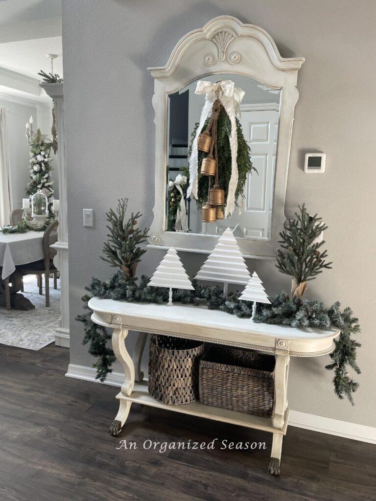 Foyer decorated in neutral colors for Christmas. 
