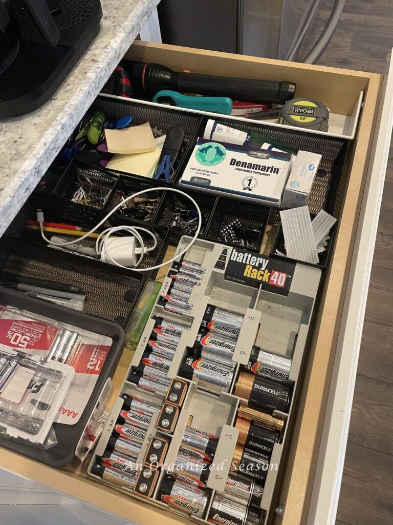 A junk drawer that needs to be decluttered during the Home Organization Challenge. 