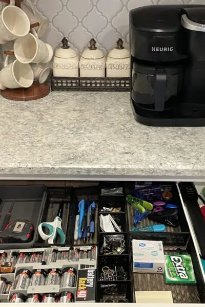 Organized junk drawer in kitchen