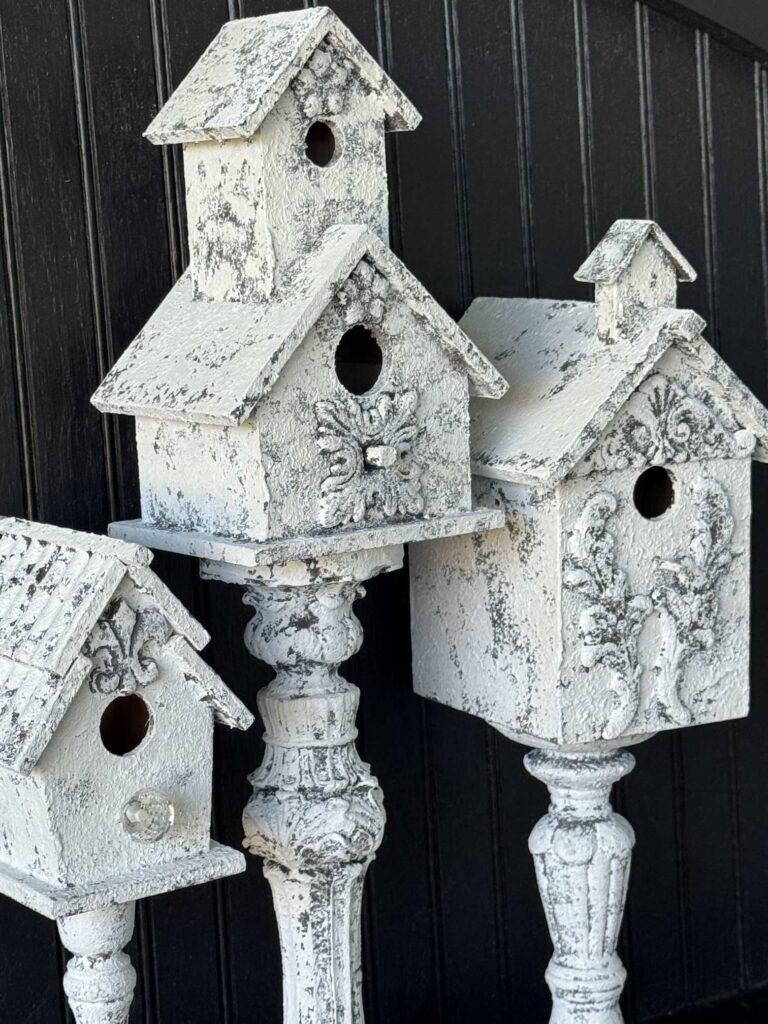 DIY Pedestal birdhouses being used as Spring decor. 
