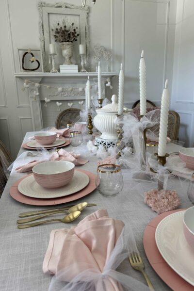 A white dining room decorated with ink for Valentine's Day.