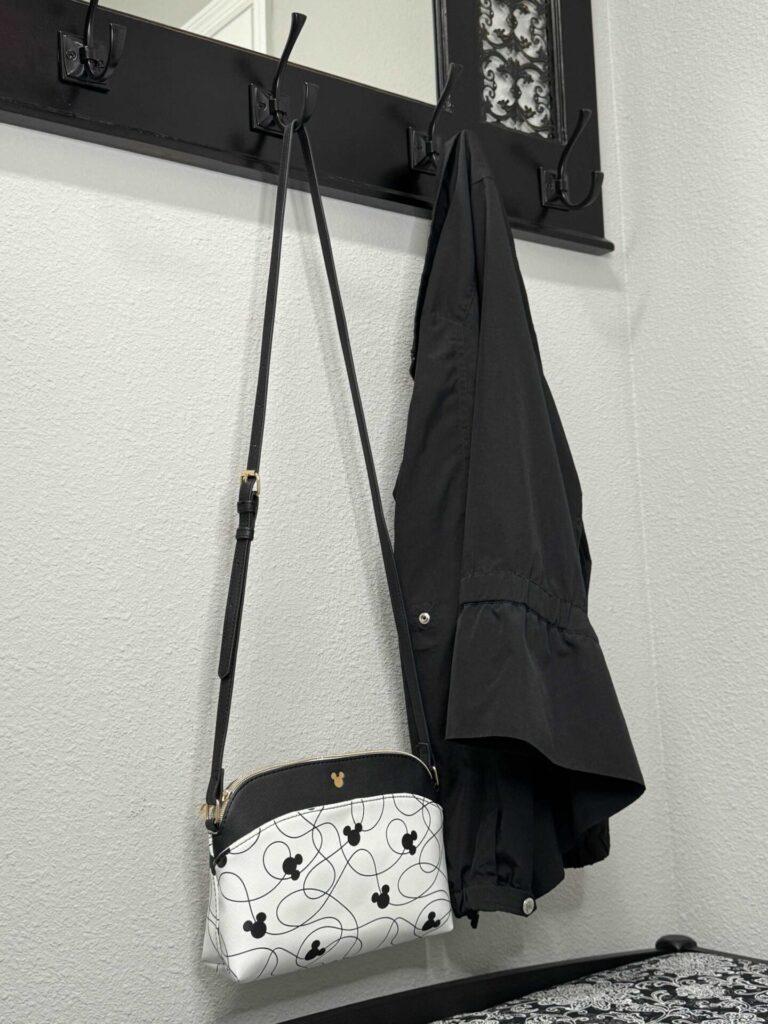 Drop zone idea number two is to use hooks to hang a jacket and purse. 