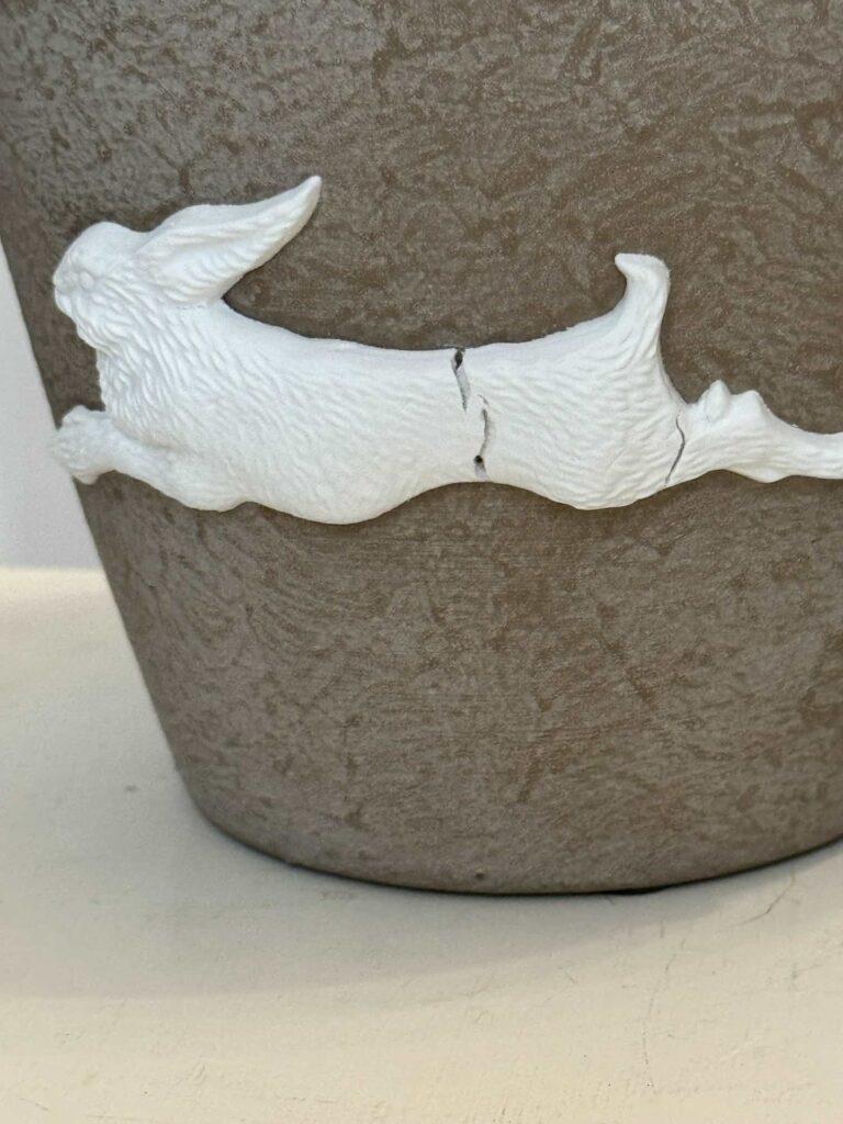 A casting of a rabbit that cracked when it dried.  