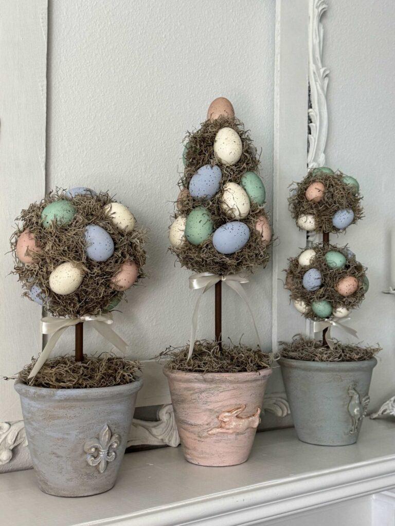 Three DIY topiaries made with eggs. 