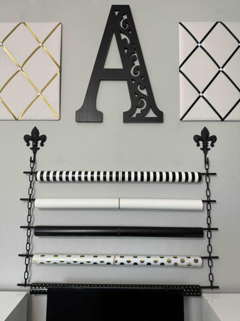 Craft room organization tip #1 is to hang your wrapping paper on the wall. 