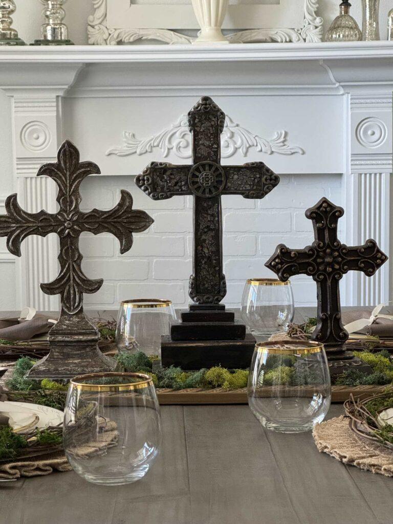 A centerpiece using three crosses is a good idea for Easter table decor.