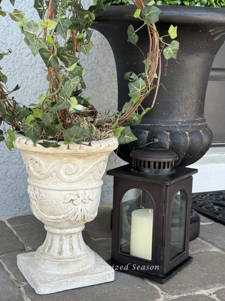 Spring porch decor idea #2 is to invest in planters you love.