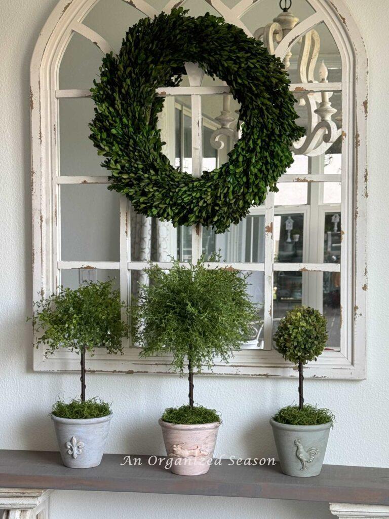 A topiary set on a shelf. 