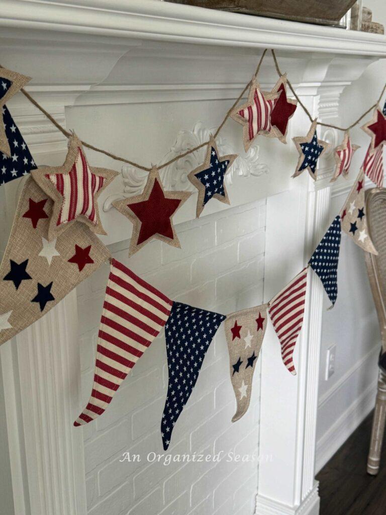 Layer two  red, whit, and blue banners on a mantel for patriotic decor! 