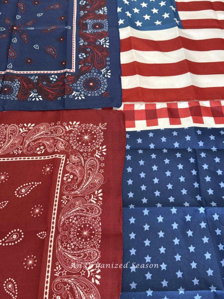 Four red, white, and blue bandanas. 