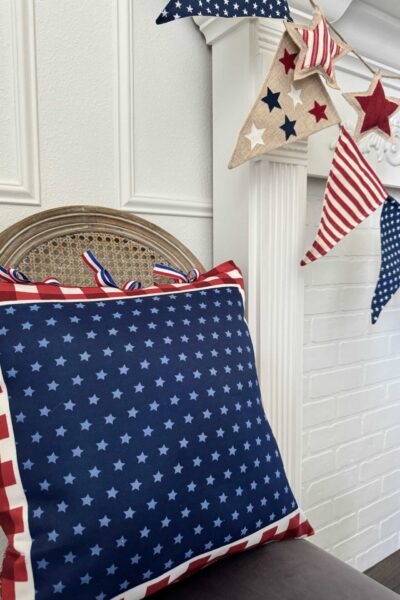 Patriotic bandana pillow in a chair.