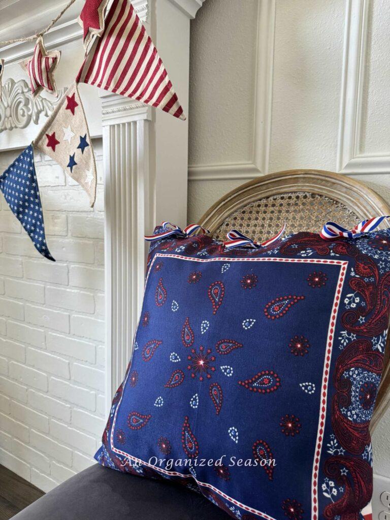 A bandana pillow on a chair.