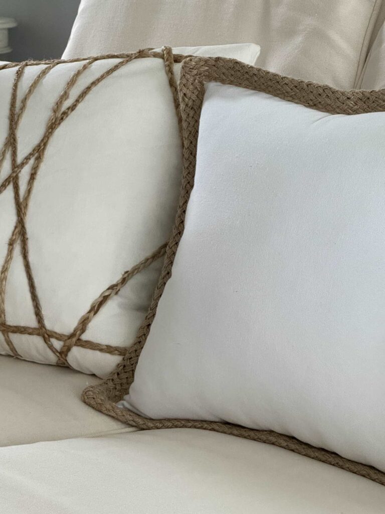 White pillows with jute twine accents. 