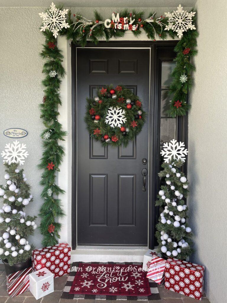 A front door decorated for Christmas. 