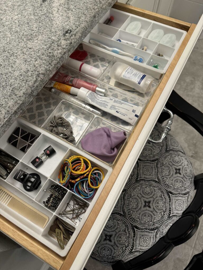 An organized bathroom drawer. 