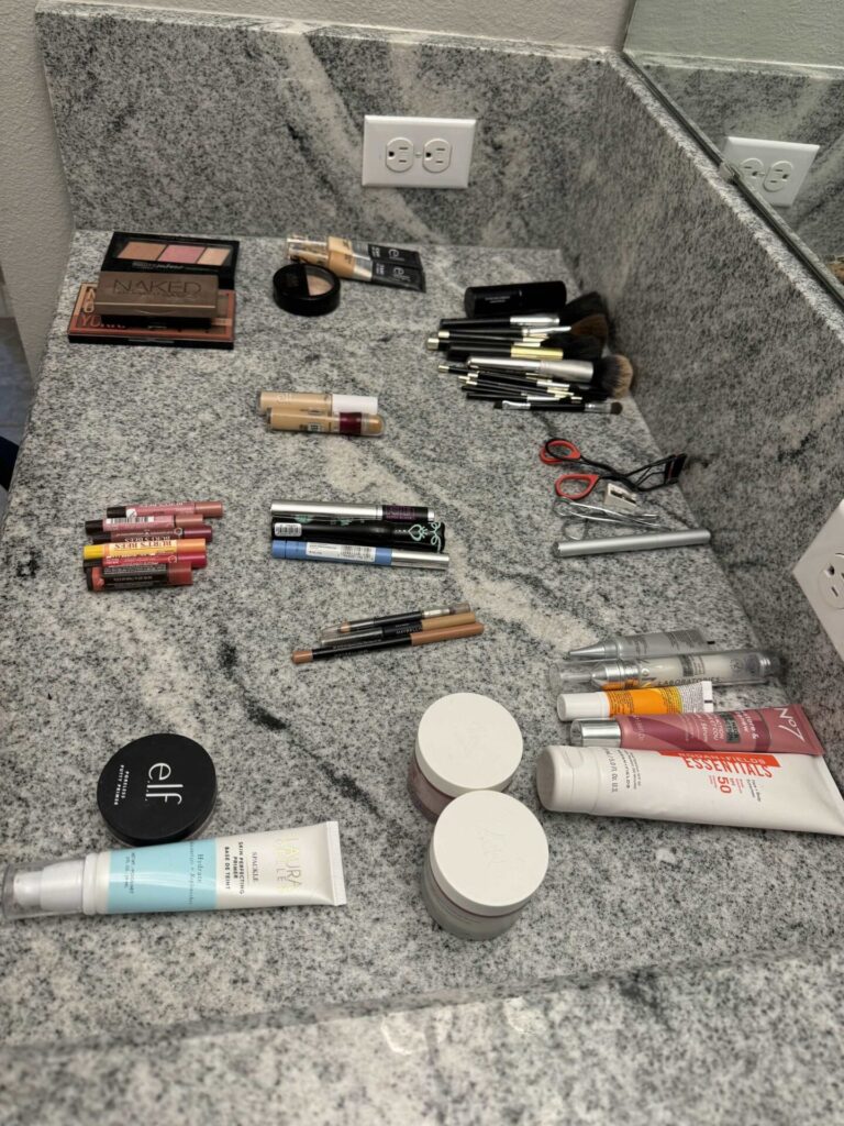 Step three to organize makeup is to place each type in a category on a counter. 