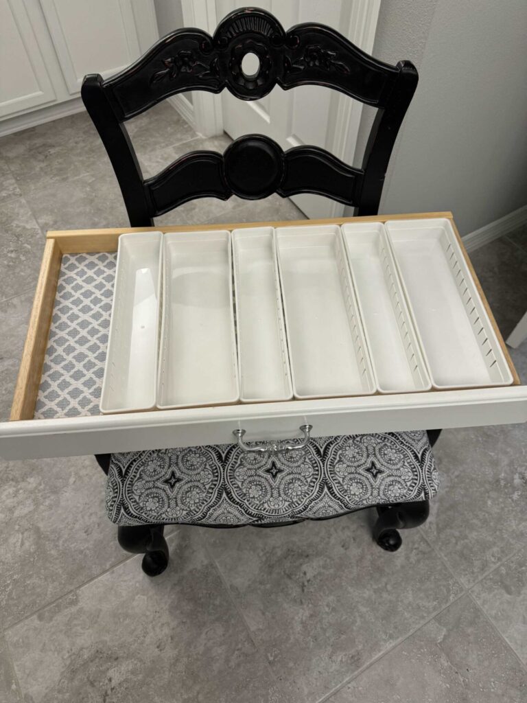 Step six to organize makeup is to place trays in a drawer. 